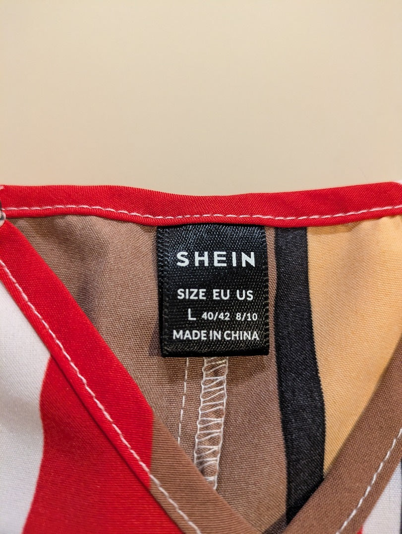 Blouse Shein - L - Rouge - motif géométrique et chaînes