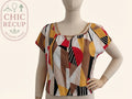 Blouse Shein - L - Rouge - motif géométrique et chaînes